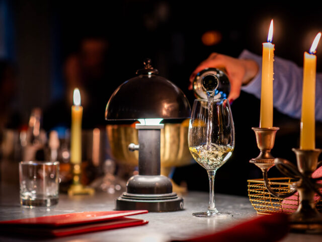 Biff's Bistro Dinner Service wine pour