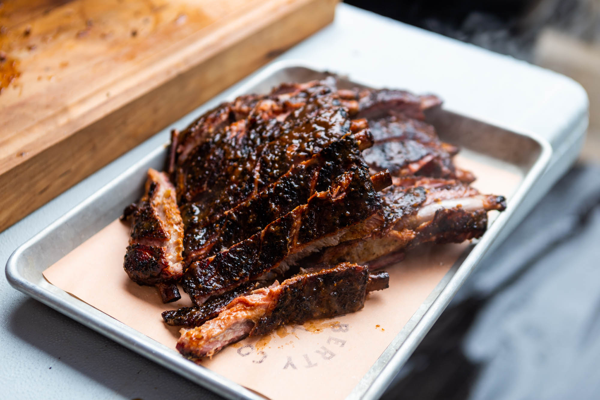 fresh bbq ribs on metal tray