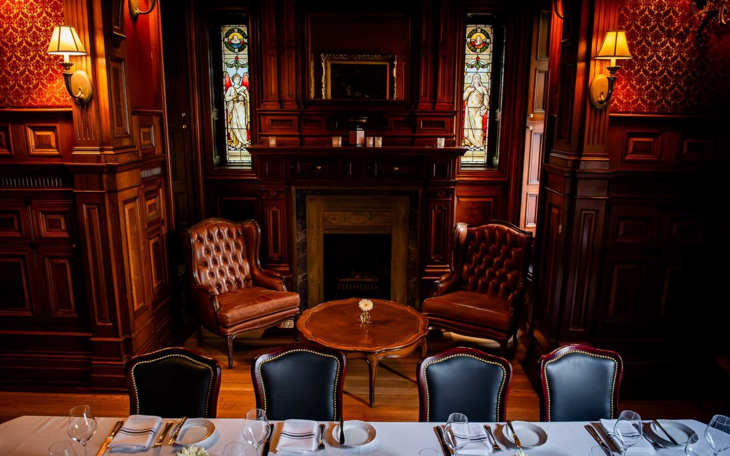 a dining room with chairs and a table