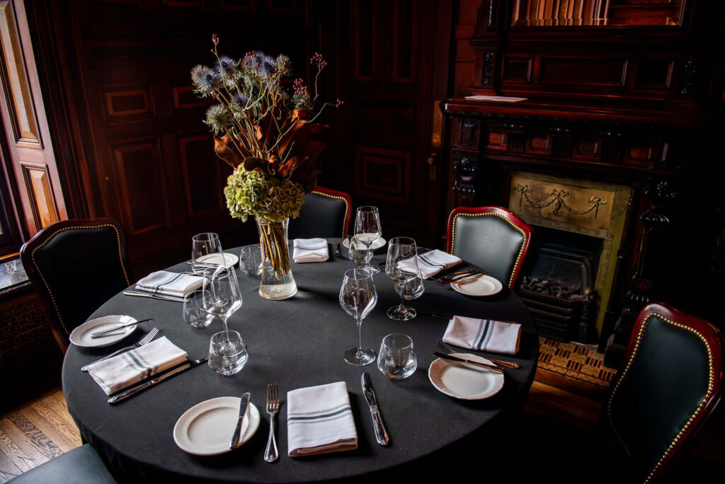 a table set with place settings and place settings