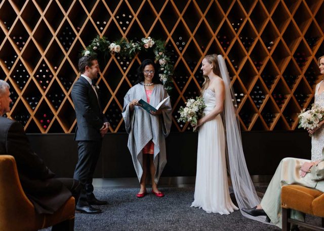 Bride and groom during wedding ceremony at Jump Restaurant
