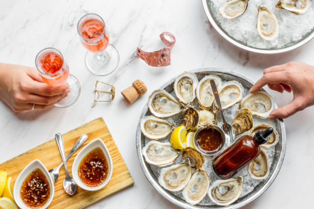 Champagne and oysters at Luma