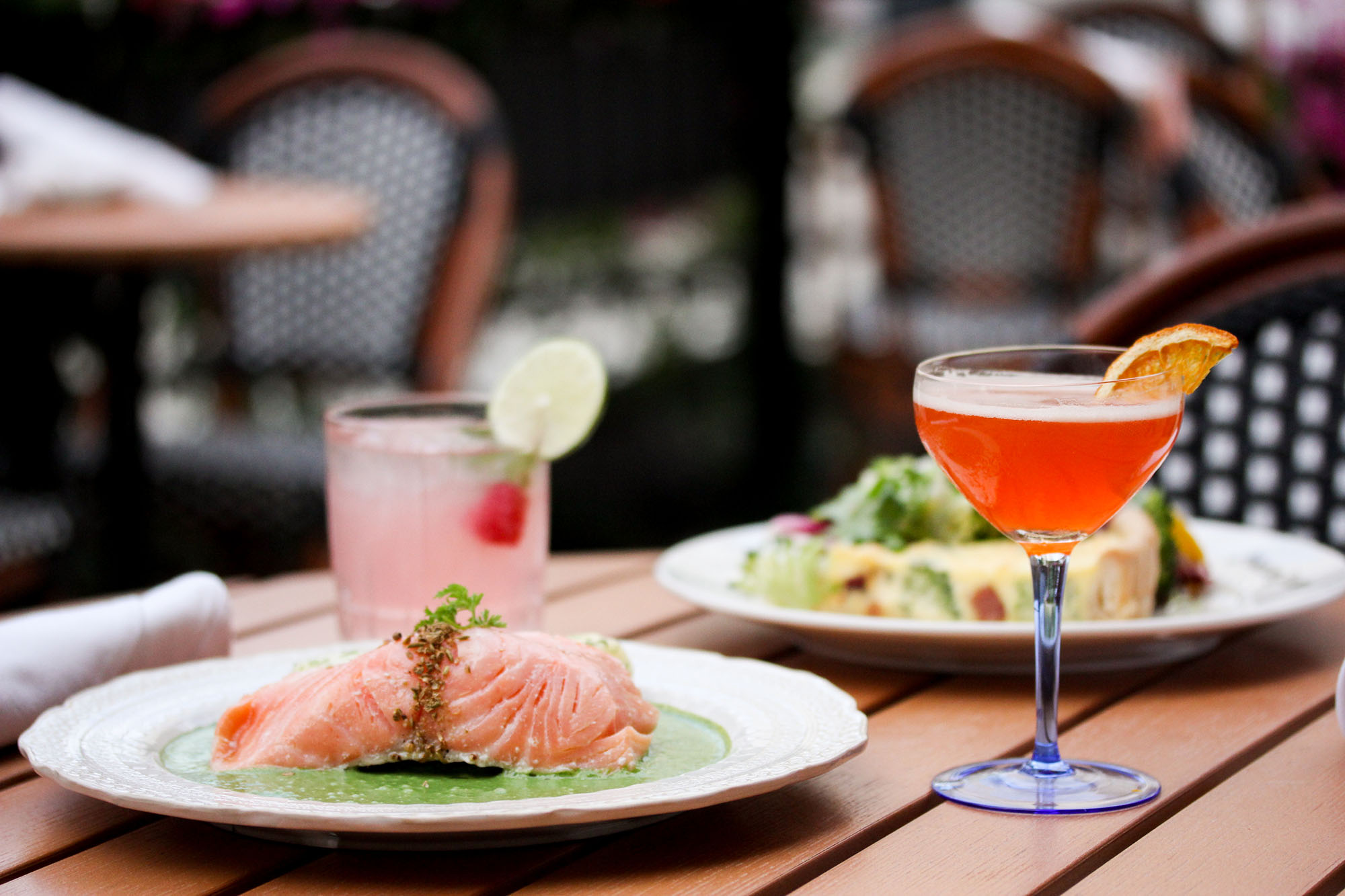 Maison Selby patio table with cocktails and lunch dishes