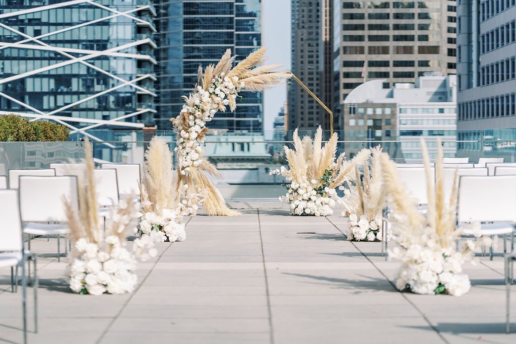 Intimate wedding ceremony set up on the rooftop at Malaparte in Toronto