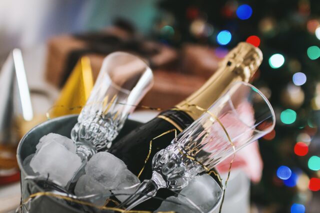 Champagne bucket with glasses and bottle