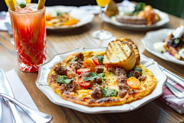 table with parcheggio frittata and caesar cocktail