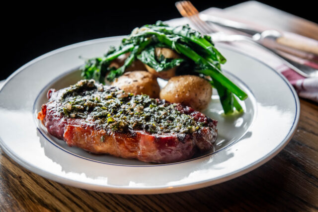 10oz STRIP LOIN STEAK with greens and roast potatoes at parcheggio