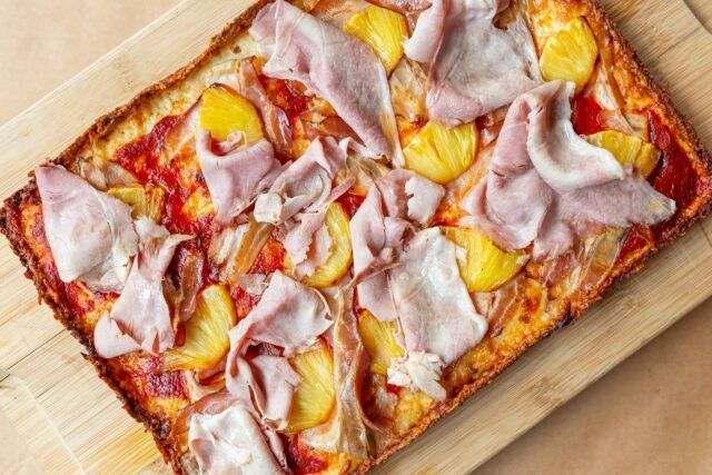 Detroit-style pizza topped with ham and pineapple at Beauty Eats in Toronto