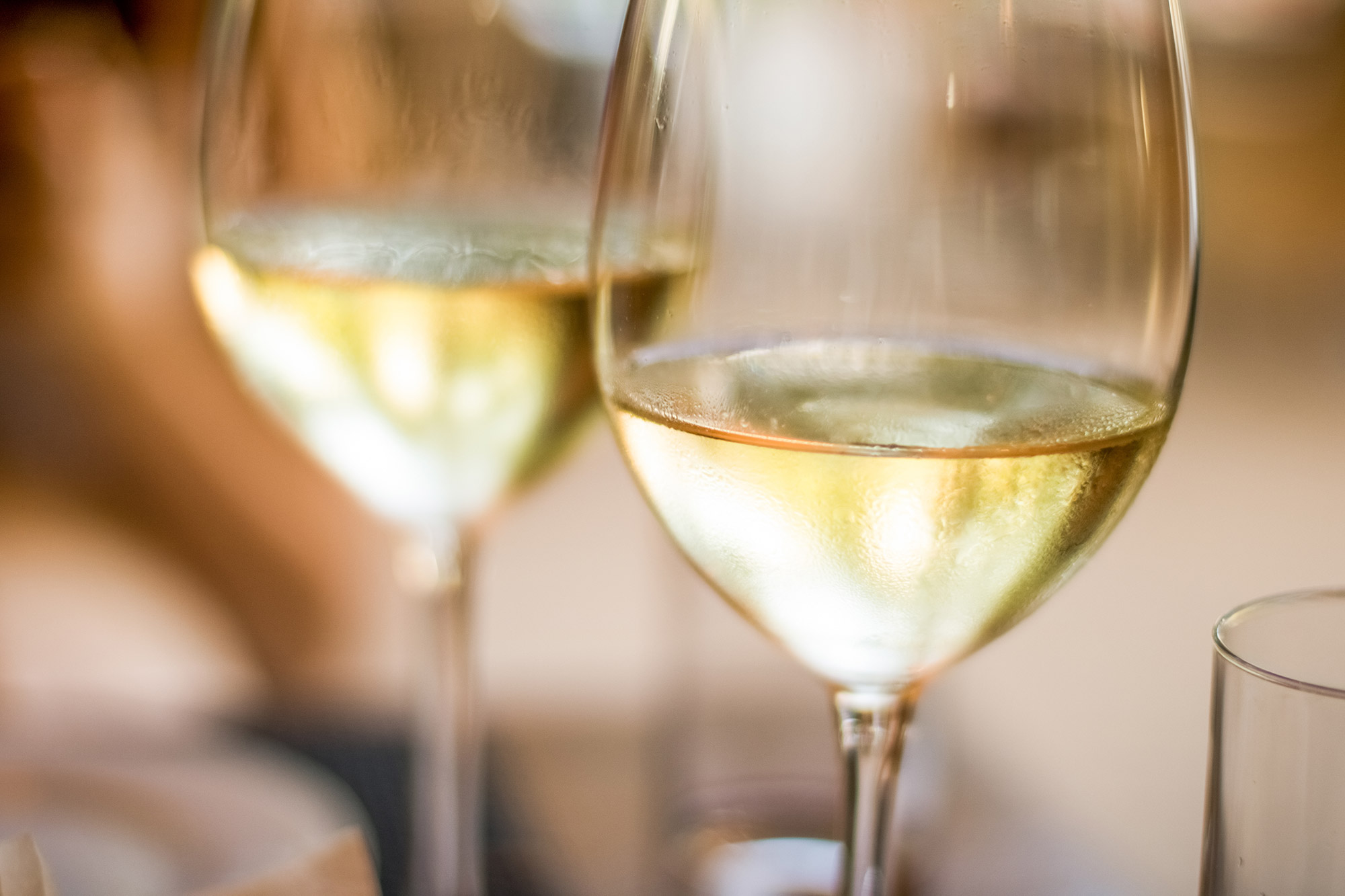 Two glasses of chilled white wine