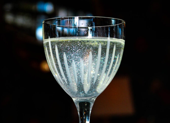 alchemy halloween cocktail with clear sparkling liquid