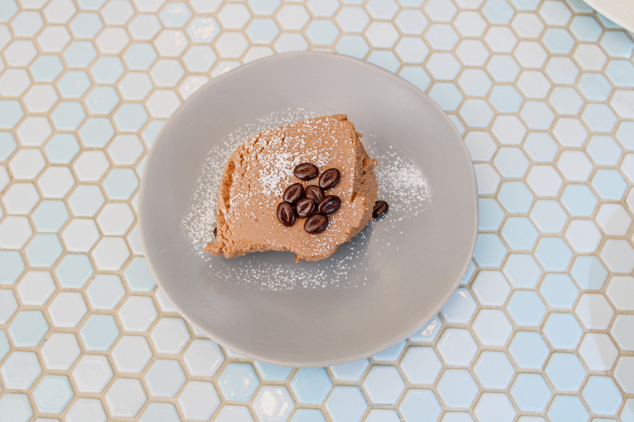 Kindred Downtown Dining Week food offerings on a blue tile tabletop