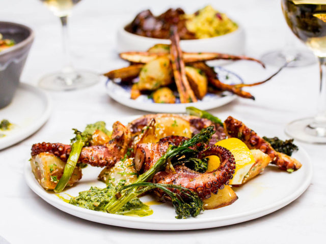 grilled octopus, sesame garlic potatoes, green harissa, spinach
